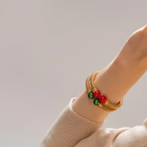 Золотой браслет Две красные жемчужины Tender